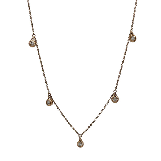 Necklace with small diamond pendants on a white background