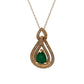 Gold pendant with a green gemstone on a white background