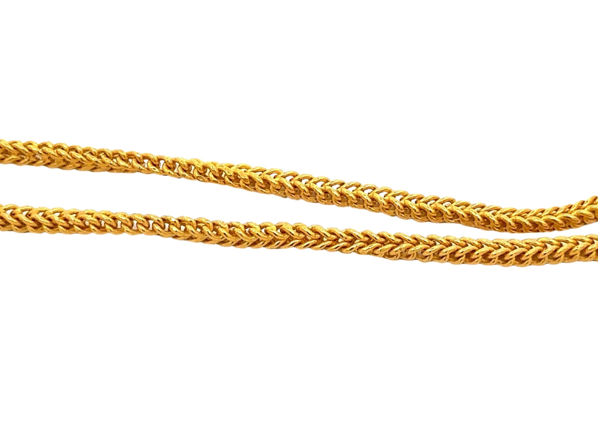 close up of yellow gold franco links