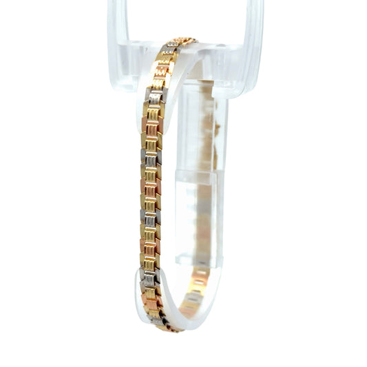 Tri-color gold flat bracelet on white background