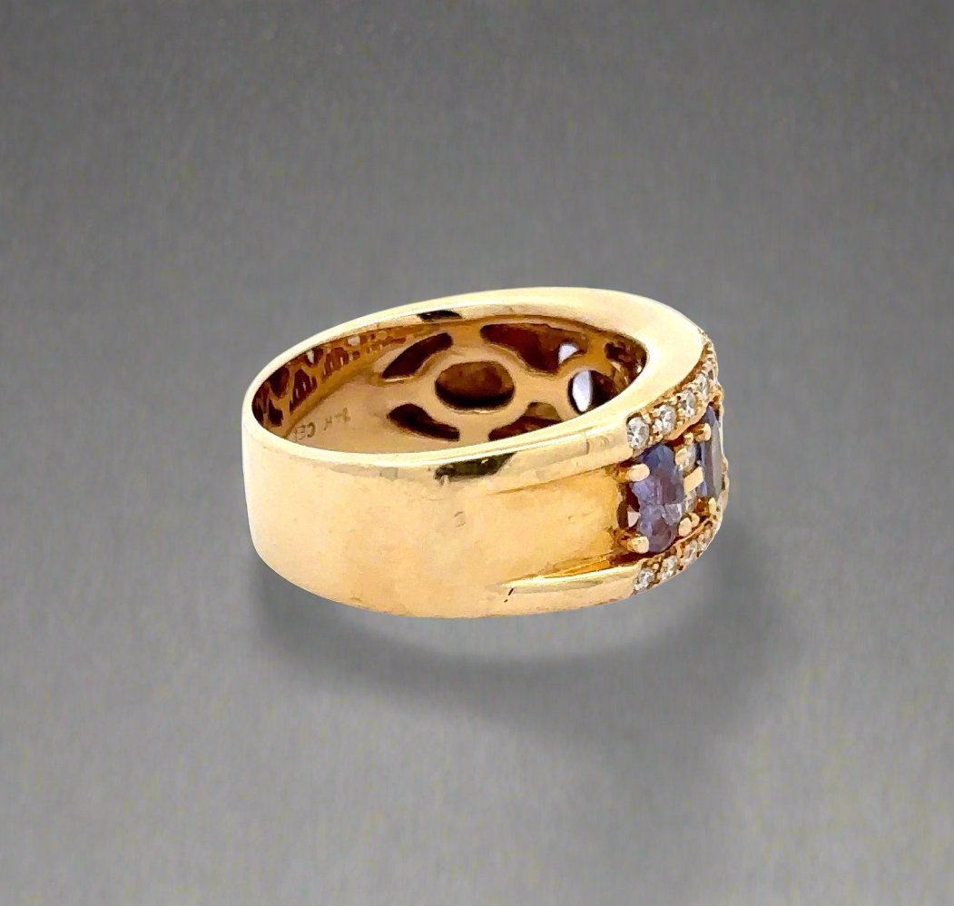 side of yellow gold band ring with scratches on gold