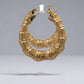 Side of yellow gold bamboo hoop earrings