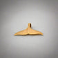 Bottom of yellow gold whale tail pendant