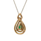 Back of yellow gold teardrop pendant with 14K stamp