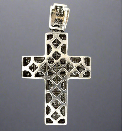 Back of white gold cross with open spaces