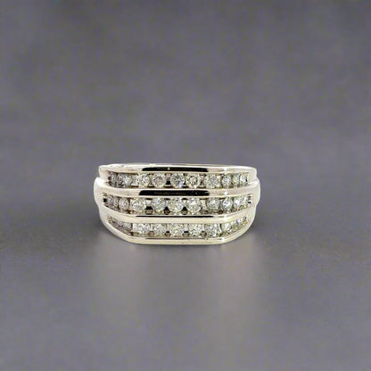 Front of white gold diamond band ring with 3 rows of small diamonds