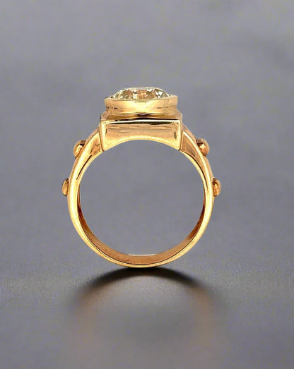 top of yellow gold ring with scratches on gold