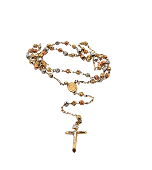 tri-color gold rosary laying down. The chain is doubled up to fit int he screen.