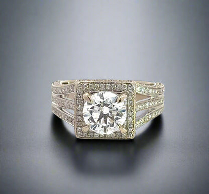 top of 1.75 carat center-stone diamond ring with small round diamonds around center-stone and on band in 3 rows