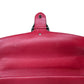 Inner flap closure in red leather. Signs of small creasing from wear