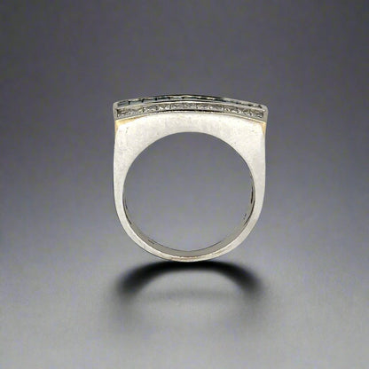 top of white gold ring with signs of wear on gold