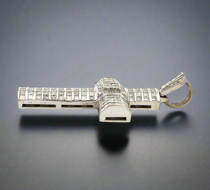 Side of white gold pendant with marks on the gold