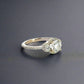 Diagonal view of white gold 3 stone diamond ring 