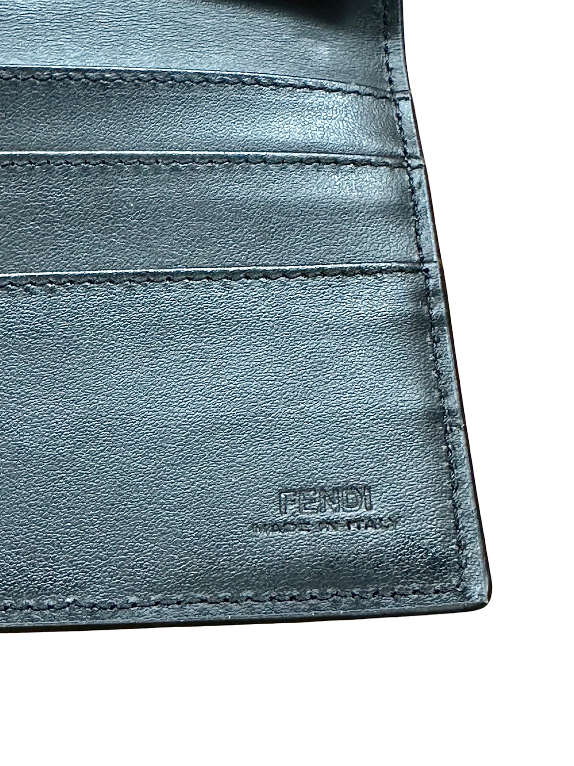 Fendi leather logo on bottom corner of wallet