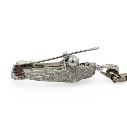 Side of pendant with round diamonds