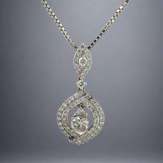 360 video of white gold diamond drop necklace