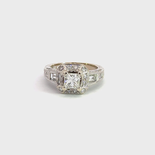 360 video of princess-cut diamond ring with halo of round diamonds, 2 round diamonds on each side of and, and 1 baguette on each side of band