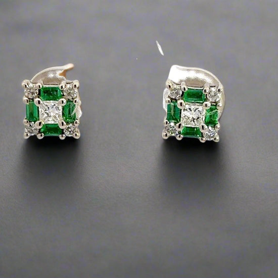 360 Video of pair of emerald + diamond earrings