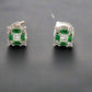 360 Video of pair of emerald + diamond earrings