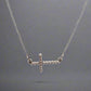 360 video of white gold cross necklace with beads