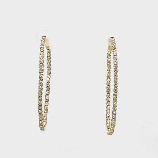 360 Video of yellow gold diamond hoops in medium size with diamonds on front and inside of hoops