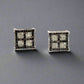 360 video of black and white diamond square stud earrings