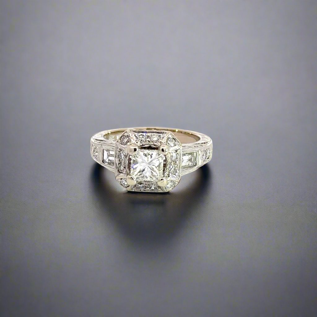 360 video of princess-cut diamond ring with halo of round diamonds, 2 round diamonds on each side of and, and 1 baguette on each side of band