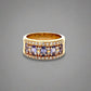 360 Video of yellow gold band ring with small round diamonds and 5 light blueish-purple oval colored gemstones and scratches on gold