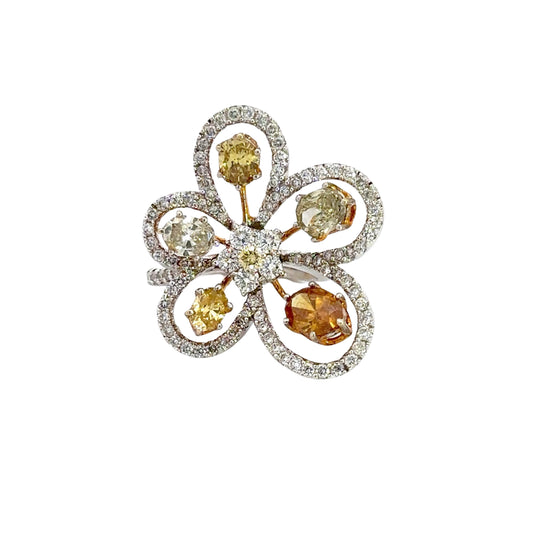 360 video of white gold diamond flower ring with 6 colored stones and marks on the gold.