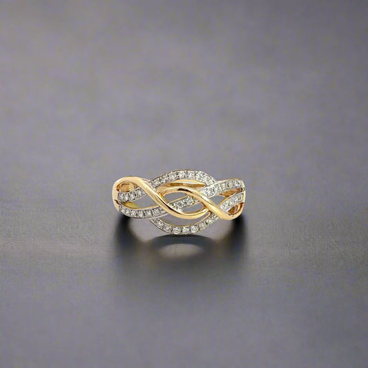 360 video of yellow gold and diamond cross over ring