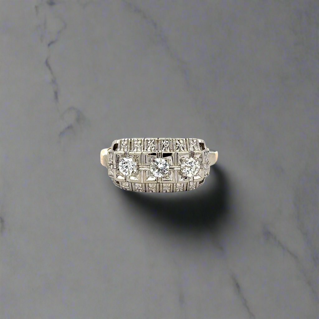 360 video of white and yellow gold diamond antique like ring with 3 round diamonds