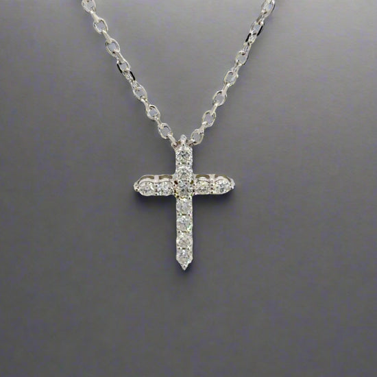 360 Video of white gold diamond cross on thin white gold link chain