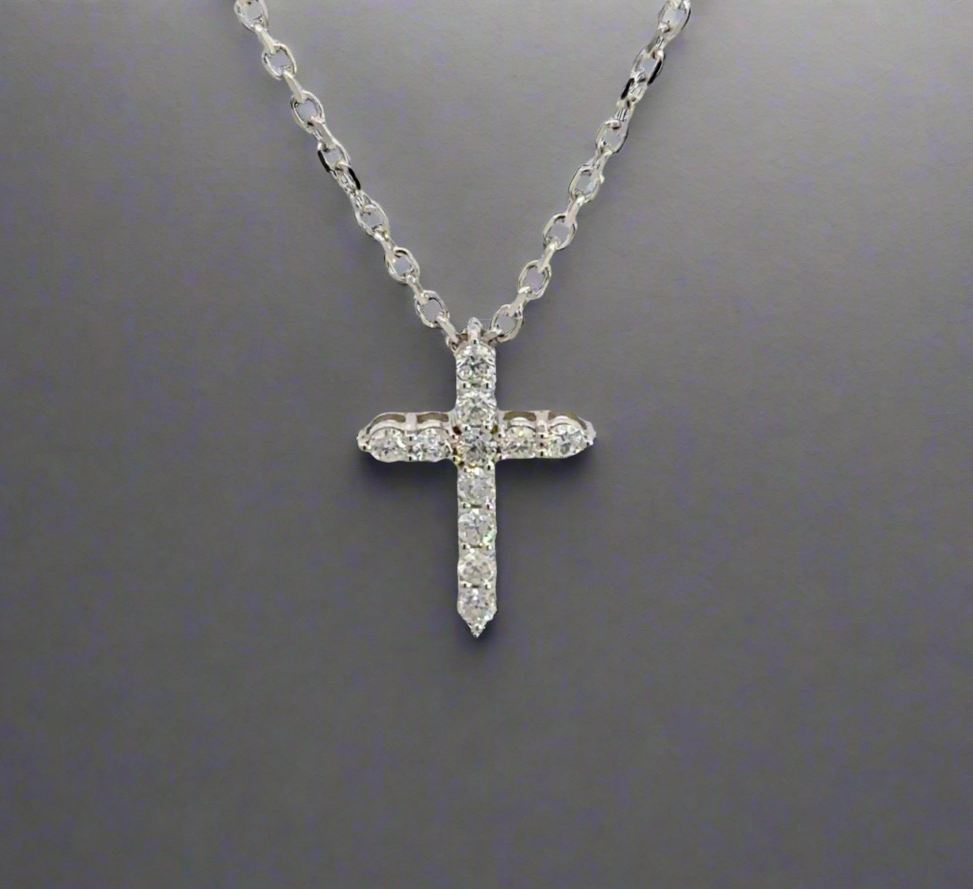 360 Video of white gold diamond cross on thin white gold link chain